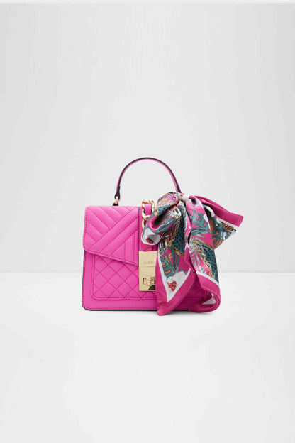 Pink quilted top-handle handbag with scarf-tied handle and gold-tone hardware