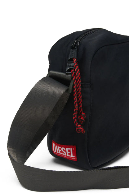 Diesel black crossbody bag with red lace trim and front Diesel label