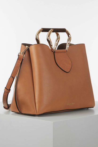 Brown structured tote bag with double top handles and adjustable crossbody strap