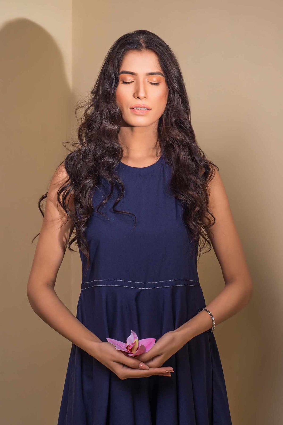 Blue sleeveless velour dress with crew neck and gathered waist seam
