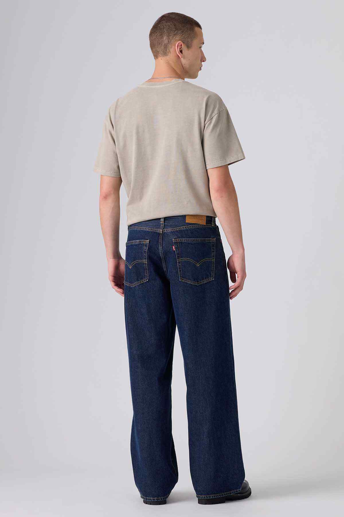 Dark wash denim jeans, back view with two rear patch pockets