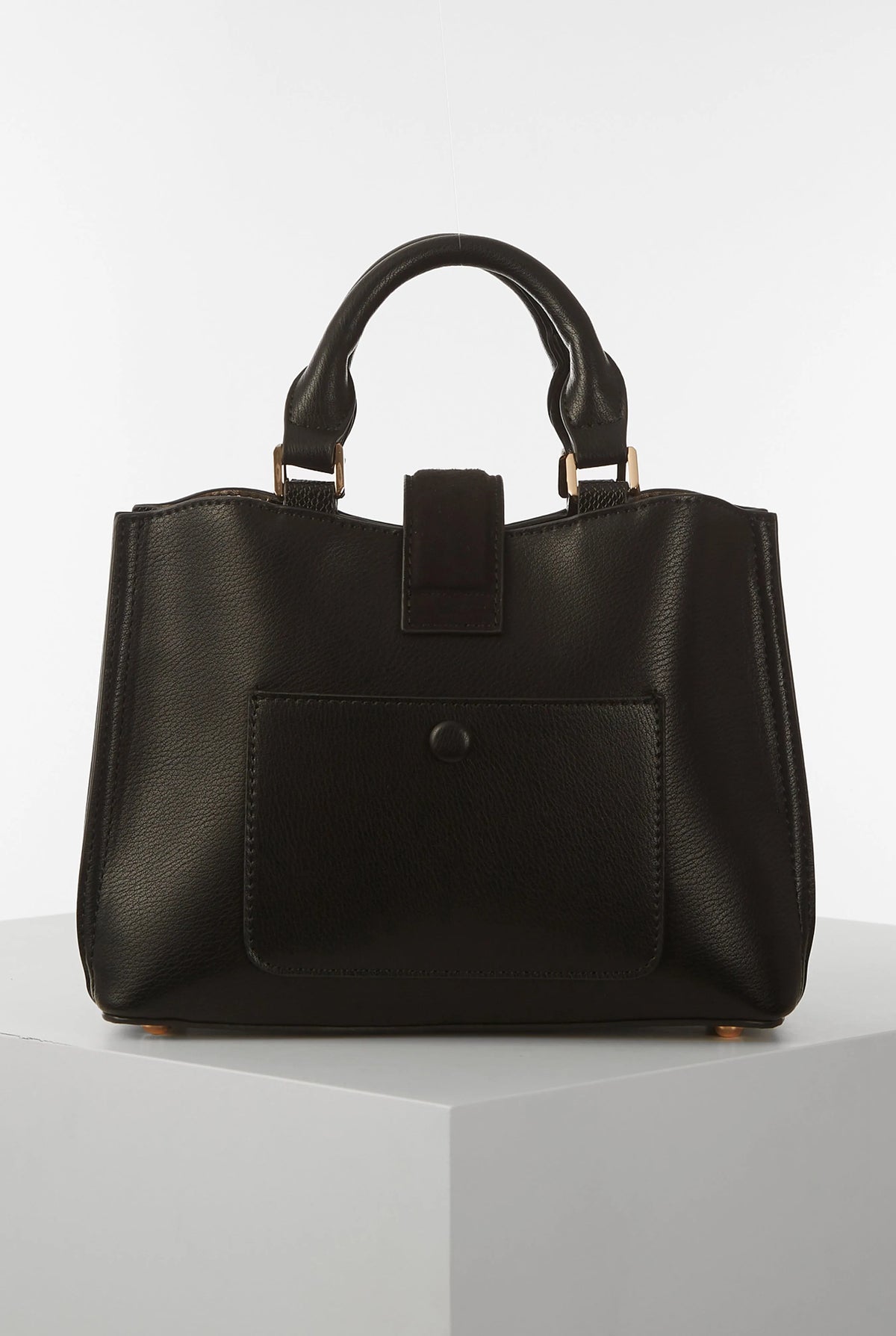 Black structured handbag with top handles, front button pocket, and clasp detail