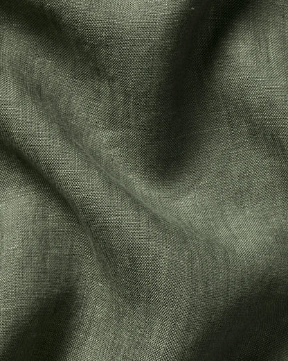 Close-up texture of green linen fabric