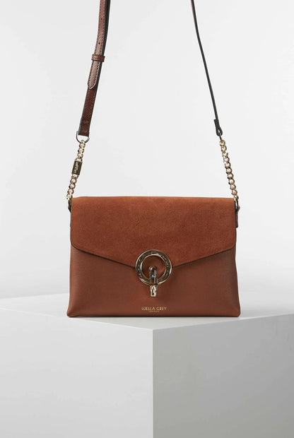 Brown flap shoulder bag with chain strap and oval clasp