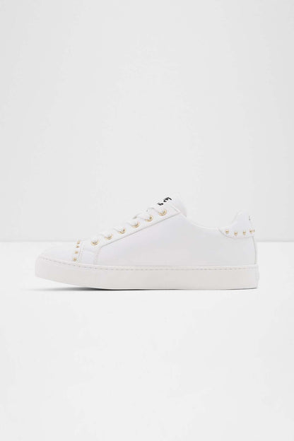 ALDO white low-top sneaker profile with studded detailing on upper