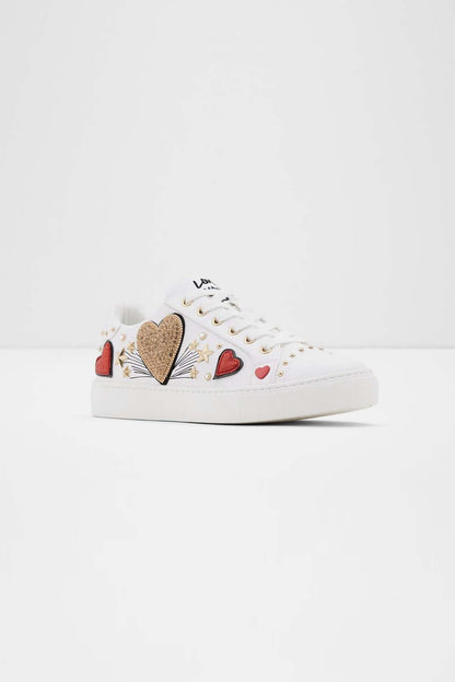 ALDO white low-top sneaker front view with heart and patch graphics
