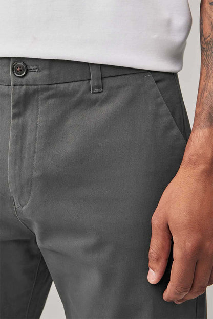 Dark grey trousers with side pocket seam and belt loops