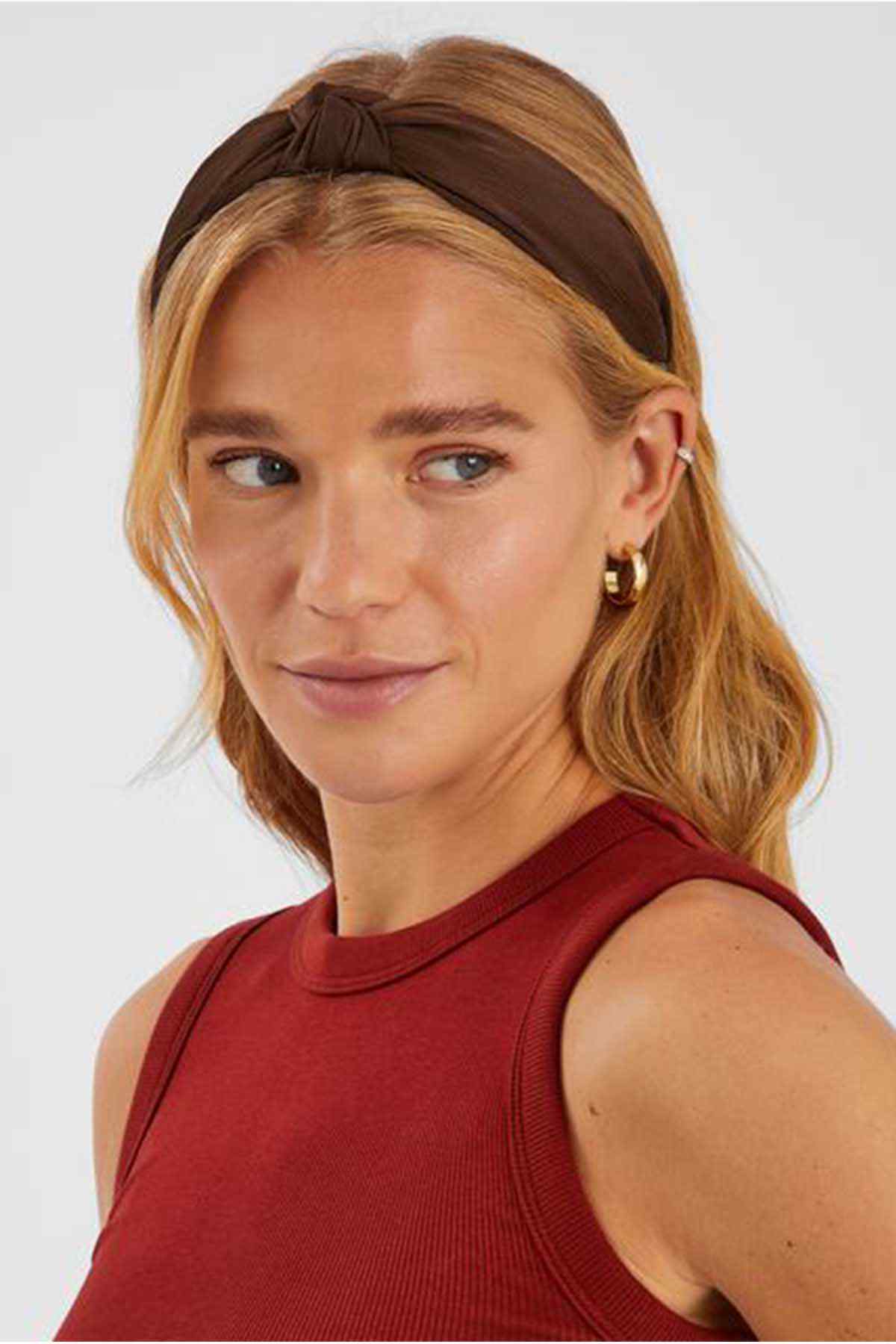 Twisted dark brown headband with knotted front
