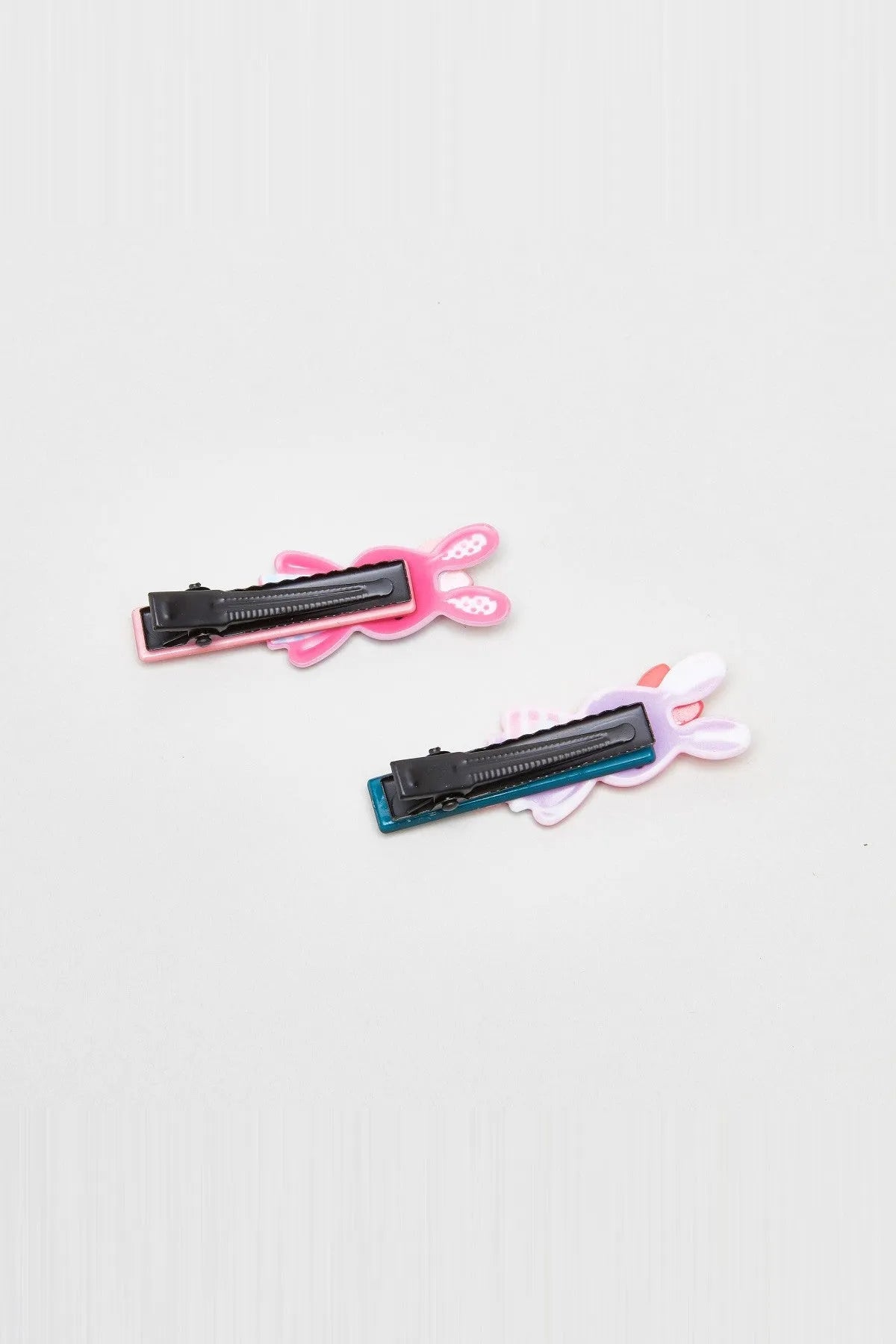 Rabbit hair clips with black alligator clips, pink and lavender pieces with blue border
