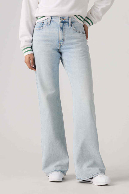 Levi's light indigo denim jeans, wide straight legs, front view with button fly