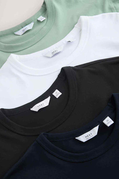 Assorted crew-neck kids T-shirts with NEXT neck labels, close-up