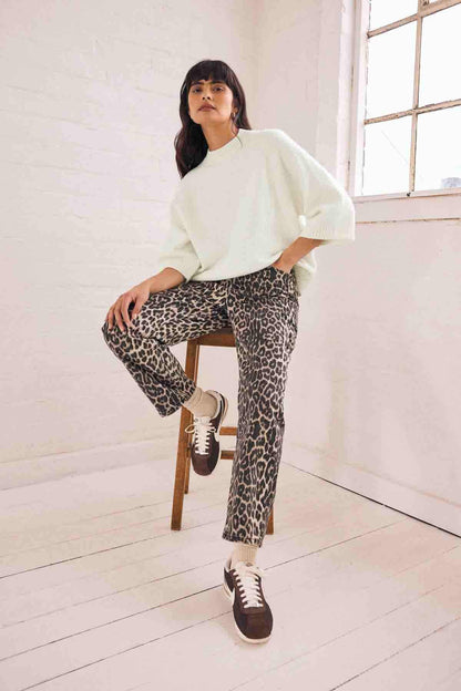 Ecru knit sweater with short sleeves, loose fit
