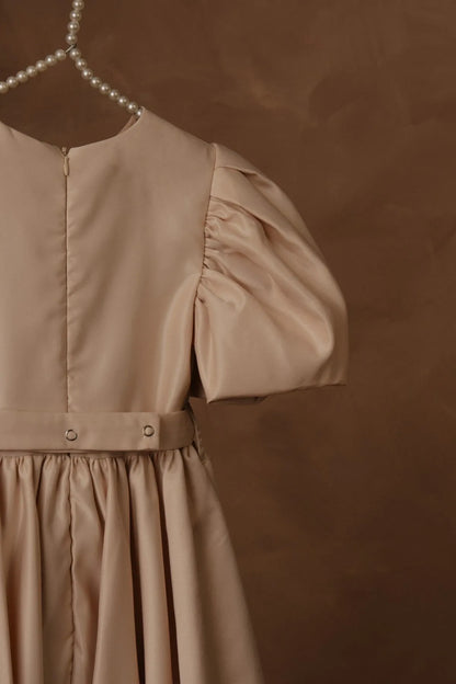 Beige puff sleeve dress with gathered skirt and side ruching near waist