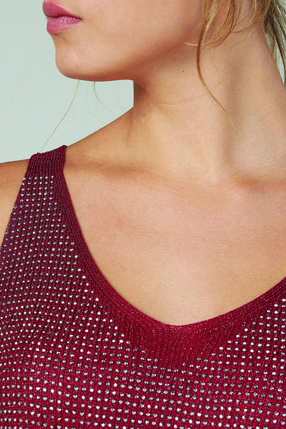 Red sleeveless V-neck tank top neckline and shoulders, textured knit
