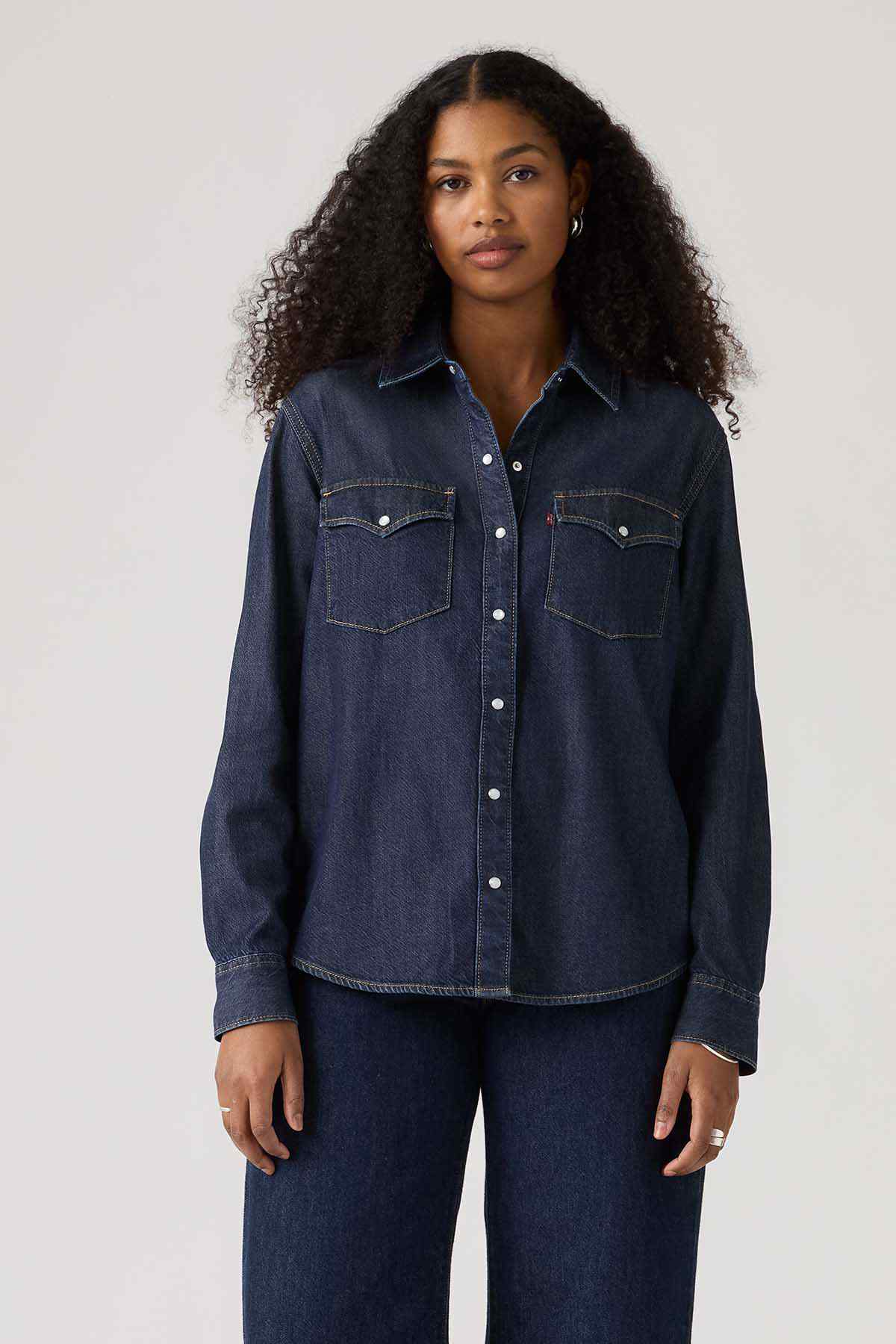 Levi's dark denim button-up with chest flap pockets and long sleeves