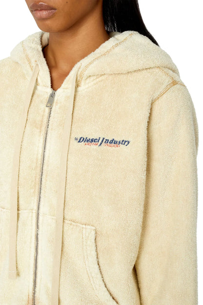 Beige fleece zip-up hoodie close-up with embroidered chest logo and zipper