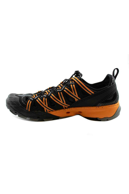 Black trail running shoe with orange striped details and textured outsole
