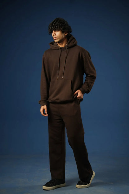 Brown straight-leg pants on model, full-length side view