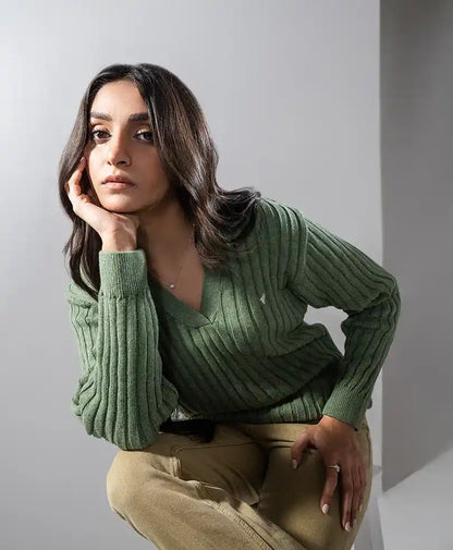 Green rib-knit V-neck sweater with long sleeves and close, fitted cut