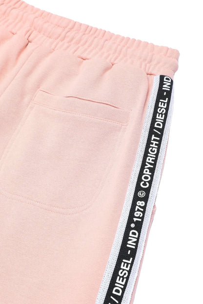 Pink jogger pants with stitched side pocket and Diesel logo tape