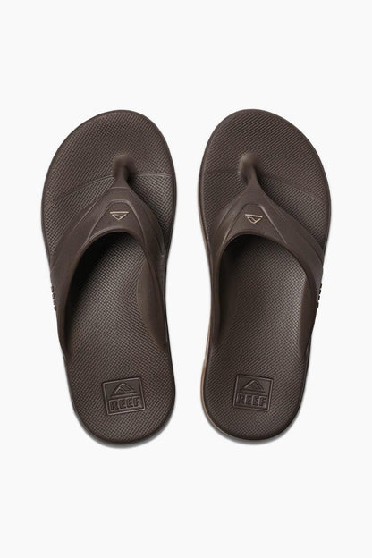 Brown Reef flip-flops, textured toe post and logo insoles, top view
