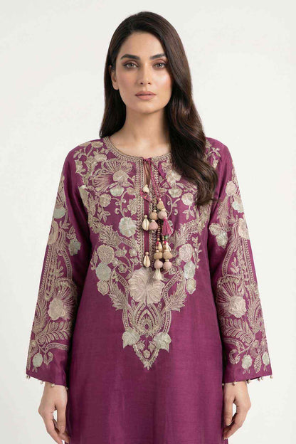 Plum kurta with intricate gold-toned embroidery and layered tassel embellishment.