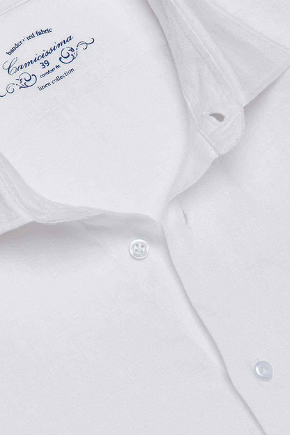 White dress shirt chest close-up with logo and top button placket