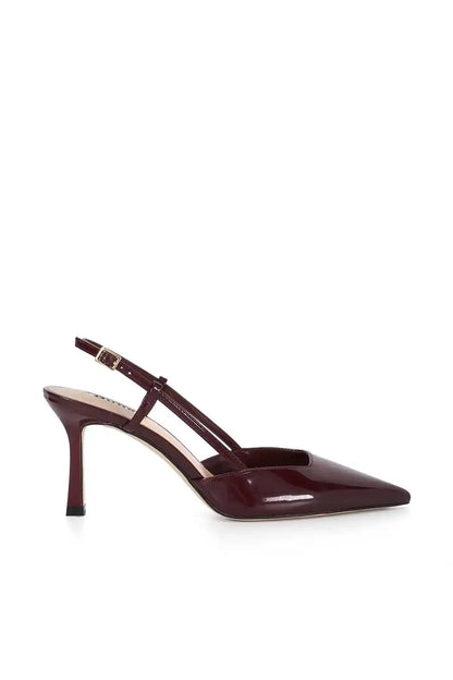 Burgundy patent pointed-toe slingback heels with thin ankle strap and stiletto heel