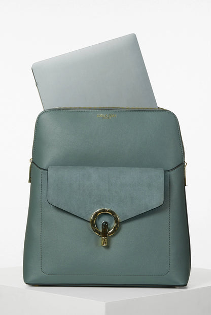 Green backpack with front flap pocket and gold-ring clasp, top open view