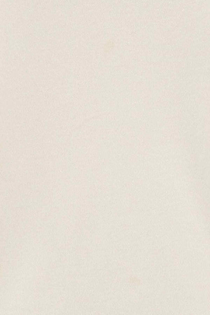 Light cream knit fabric close-up