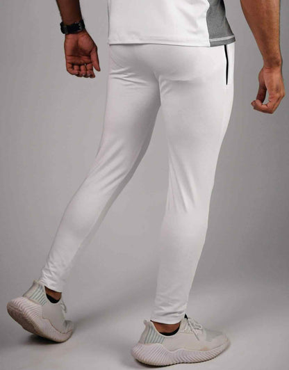 White compression leggings, side view with side pocket seam and ankle hem