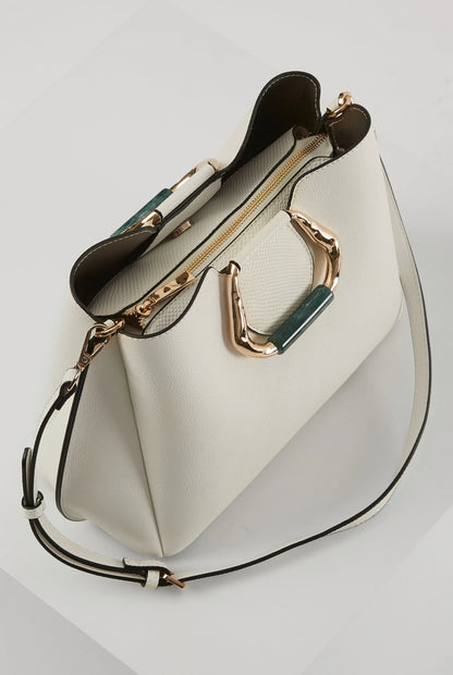 White handbag with detachable shoulder strap and gold hardware with open top