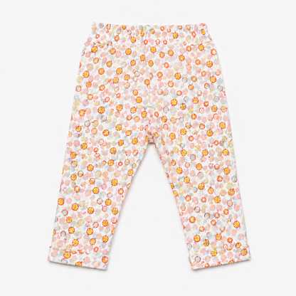 BABYSHOP baby pants, white fabric with colorful fruit print, elastic waist, back view