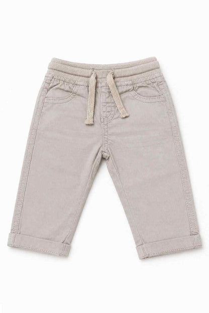 Beige baby pants with elastic waist, drawstring tie, and two front patch pockets