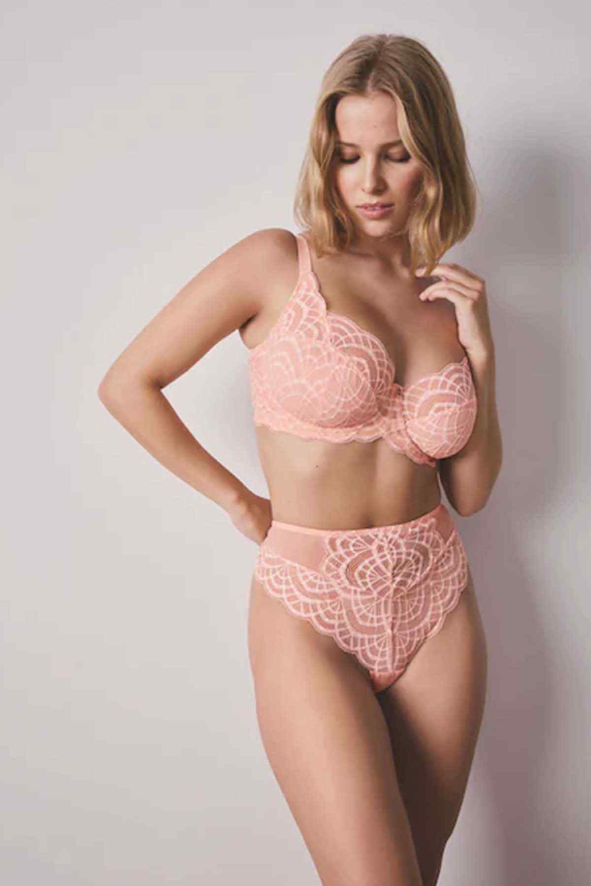 Coral pink lace bra and briefs set with underwire cups.