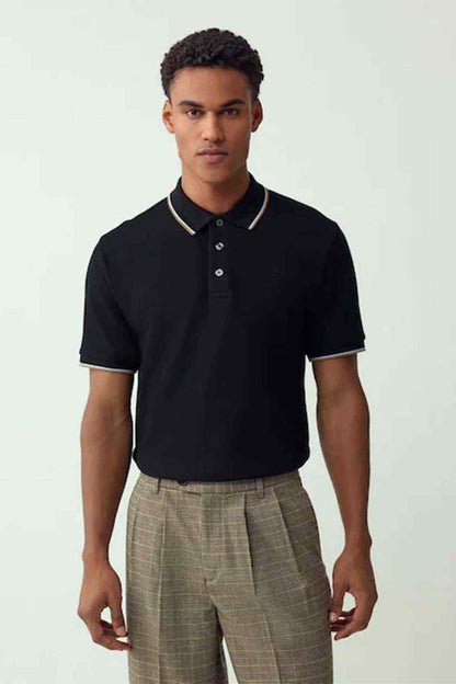 Black short-sleeve polo shirt with contrast collar trim and button placket