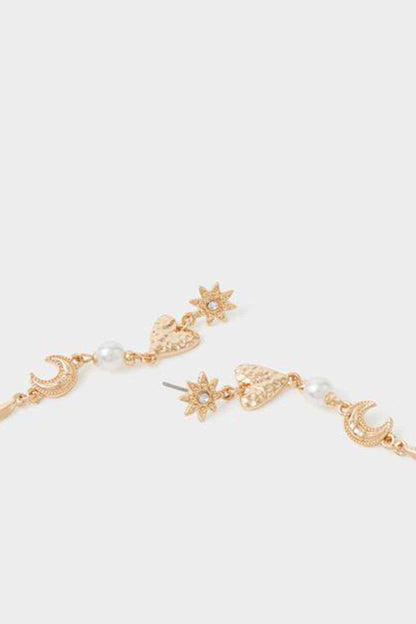 Gold charm bracelet with star, moon, and pearl dangle beads