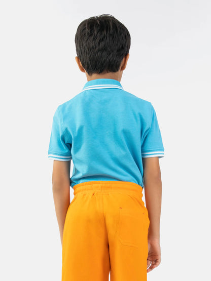 Light blue cotton polo shirt back view with striped collar and short sleeves
