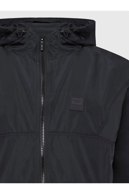 Black hooded jacket close-up of full zipper and chest logo patch