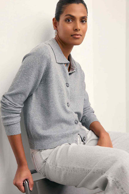 Light grey polo knit top with button placket and ribbed cuffs