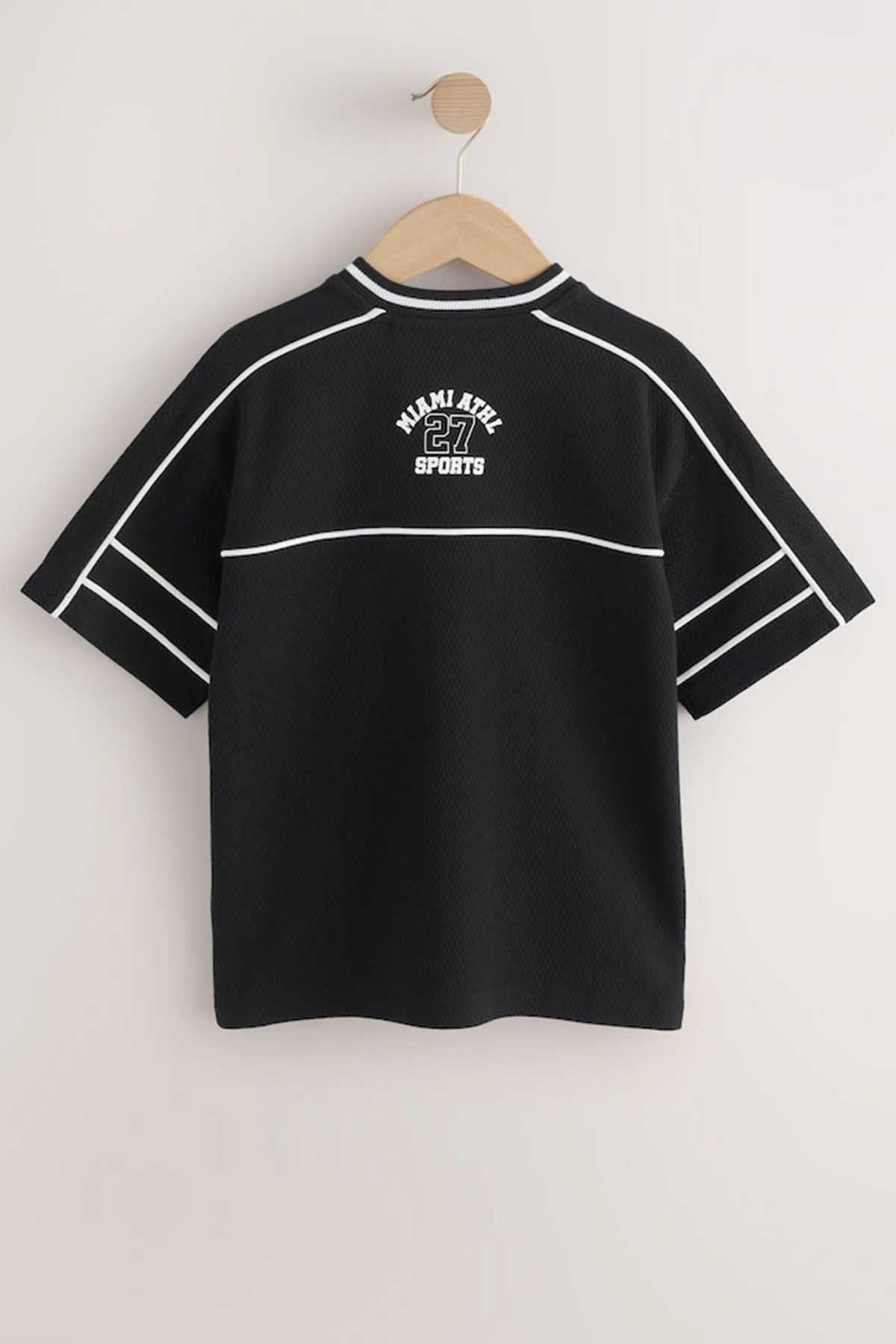 Black kids sports jersey with striped collar and Miami 27 graphic