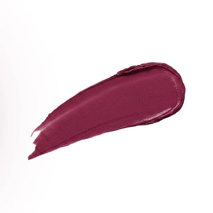 Berry-red velvet lipstick swatch, creamy opaque texture