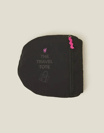 Black travel tote pouch with pink zipper tab and â€œTHE TRAVEL TOTEâ€ logo