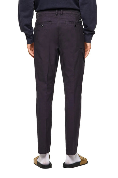 Diesel dark navy trousers on model, straight fit with tapered legs