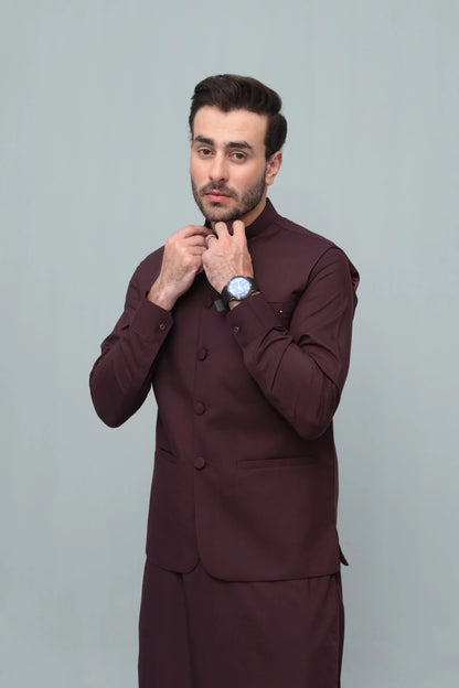 Dark maroon stand-collar waistcoat with button front and chest pocket