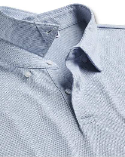 Light blue polo collar with button placket and stitched trim