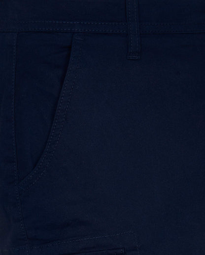 Navy shorts close-up: angled side pocket and stitched leg seam