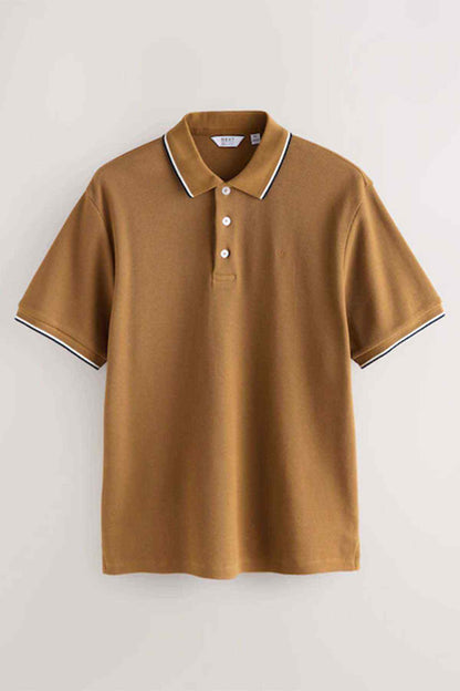 Tan polo shirt on hanger with white-and-navy trimmed collar and button placket