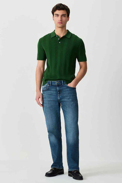Green polo shirt with short sleeves and buttoned collar