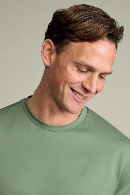 Men's green T-shirt close-up of crew neck